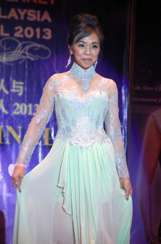 Mrs Most Courageous  Jena Chuan at 60 in evening gown