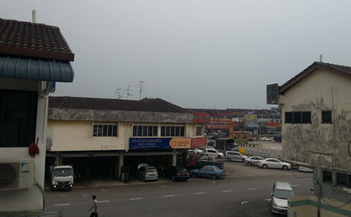 Taman Rosmerah, Johor Bahru. It's just started to drizzle. (04:00pm). Photo by Jez Tay.