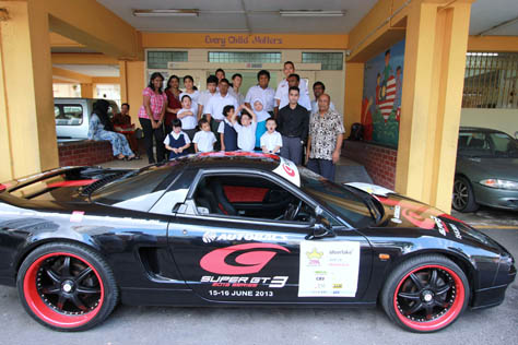 Super GT500 car in front of SAMH