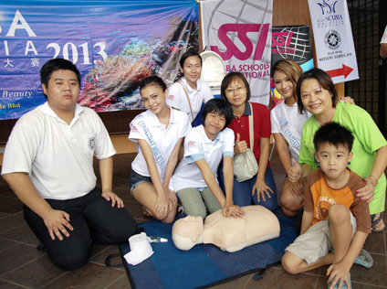 a CPR hands-on session using plastic dummies conducted by a CPR Team from 