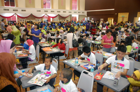 Special needs people participating at the Rainbow in My Heart Art Competition 2013 at Segi University, PJ.