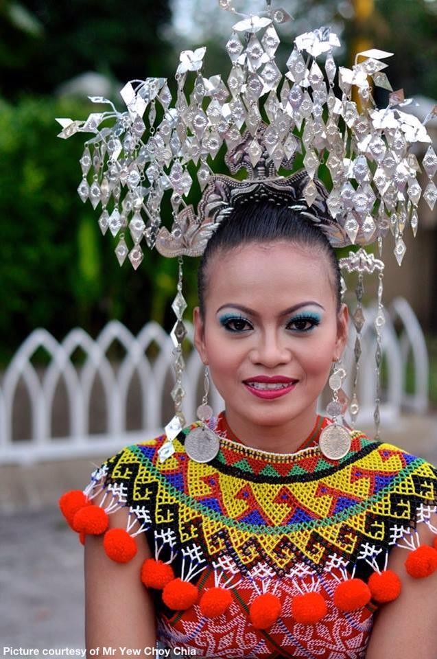 Pretty Iban girl in her traditional costume
