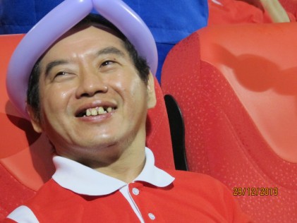 Mr Ang Choo Sien is smiling to the camera