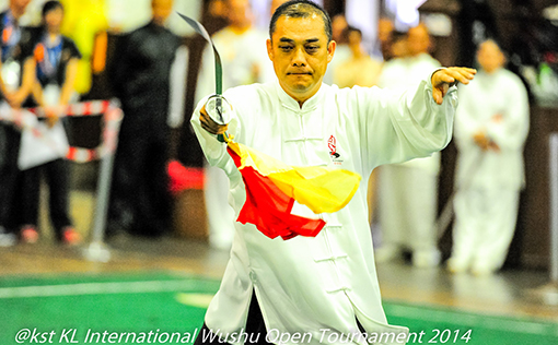 A competitor from Melaka in the Taiji (weapons) category
