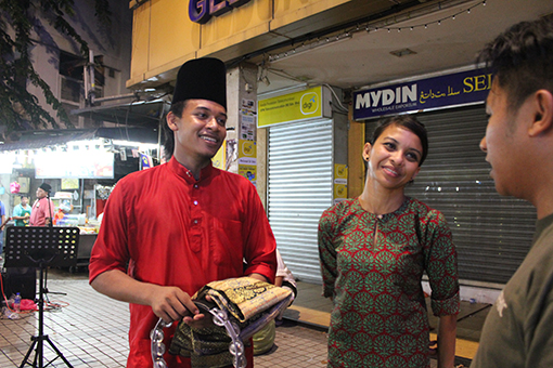 Nur Cahaya seen here with Group Leader Amir Hamzah Mohd Jamil, 23. He believes this is an excellent opportunity to showcase Malaysian music talent to tourists