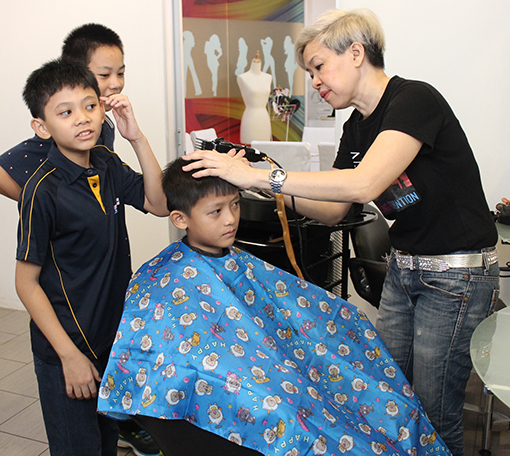 The children of Shelter Home getting their stylish haircut at the S'Pro Hairdressing Salon.
