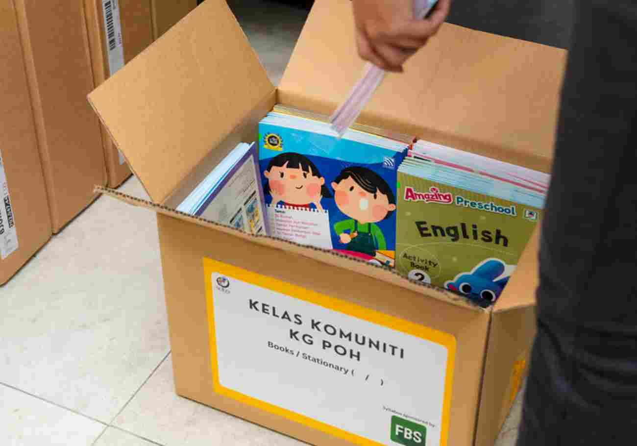 FBS and SUKA Society vVolunteers diligently prepare educational materials for Orang Asli preschools, fueled by collaboration and a commitment to equity.