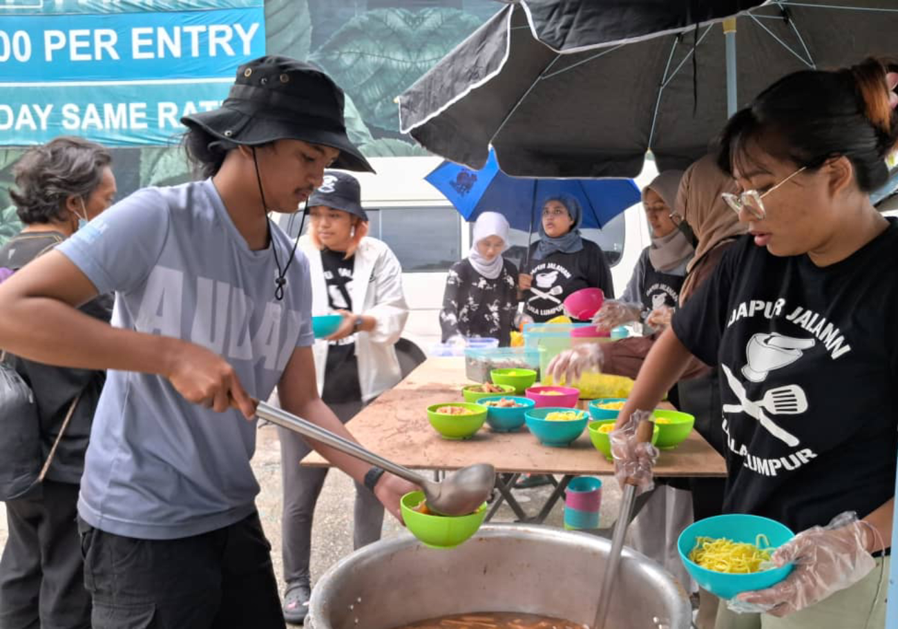 Every Sunday, a scene unfolds on Jalan Panggong in Kuala Lumpur, where Dapur Jalanan, a volunteer-run organisation, transforms the street into a haven for the city's most vulnerable residents.