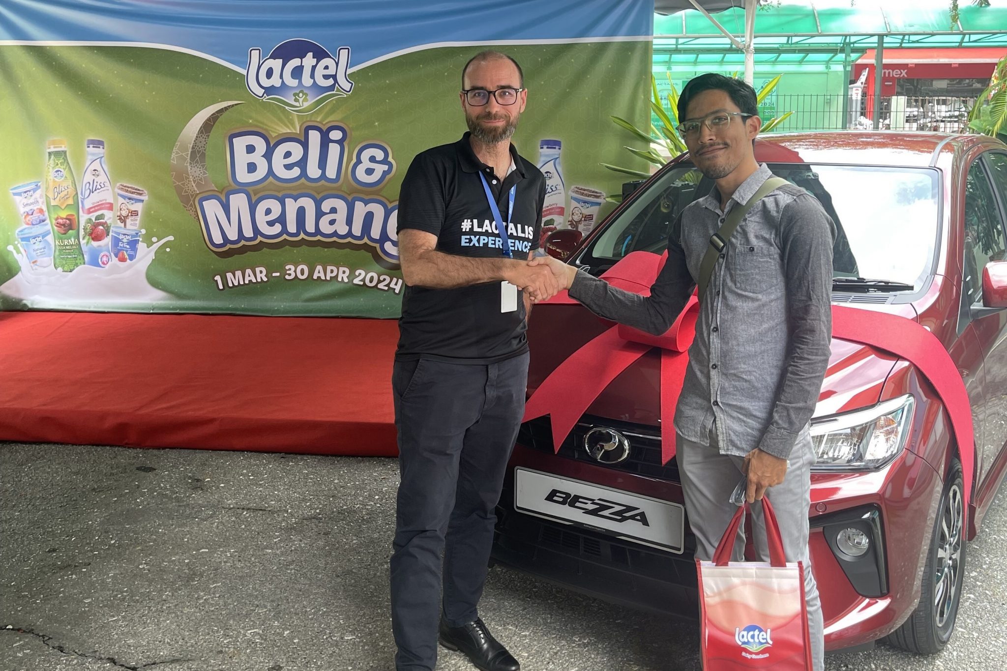 Lactel contest winner drives home brand new Perodua Bezza