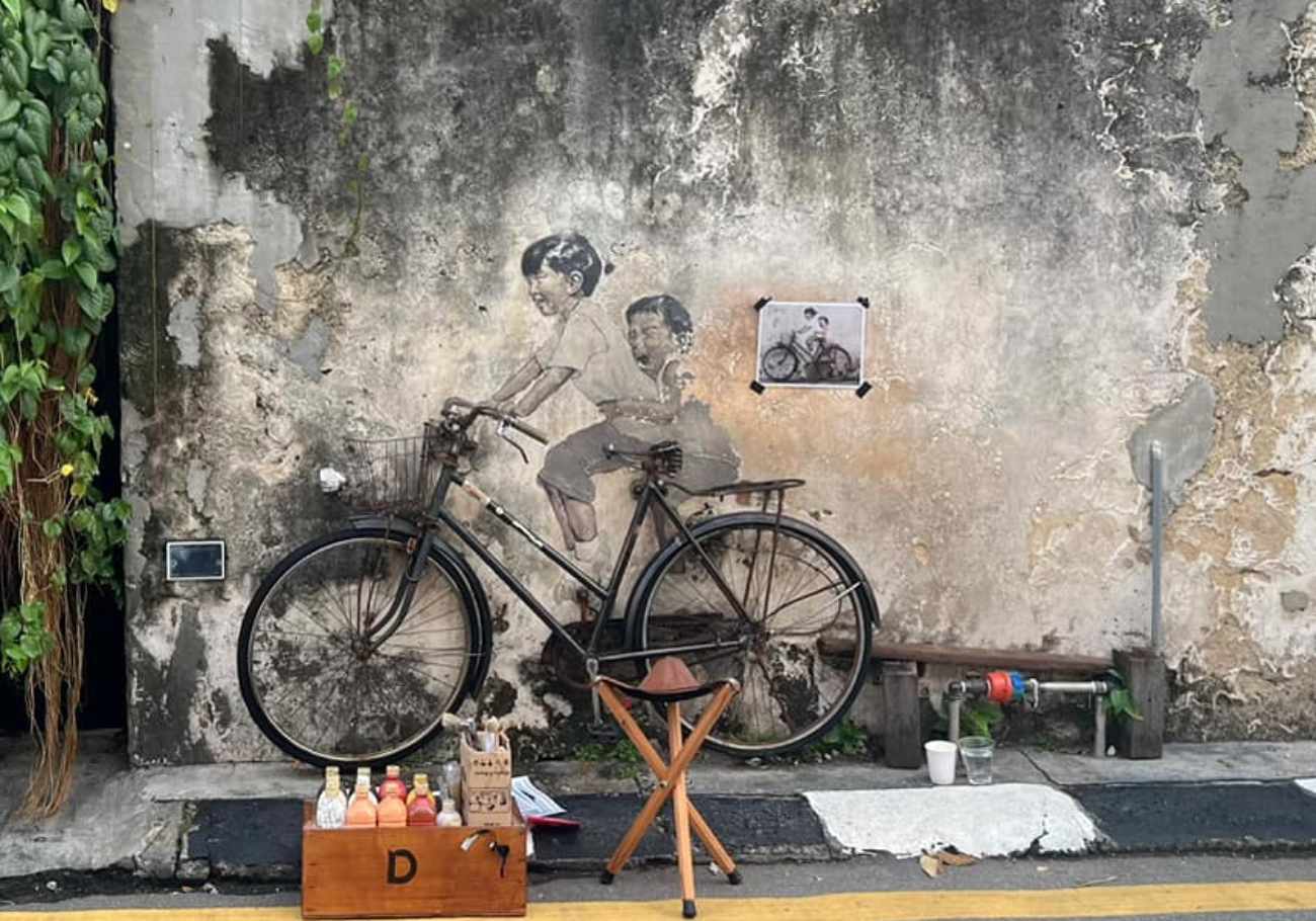 Ernest Zacharevic restores iconic Penang murals