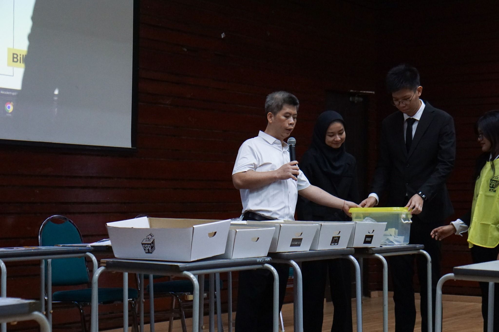 Crowd engages at Tindak Malaysia electoral reform exhibit.